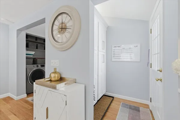 a view of storage and utility room with washer and dryer