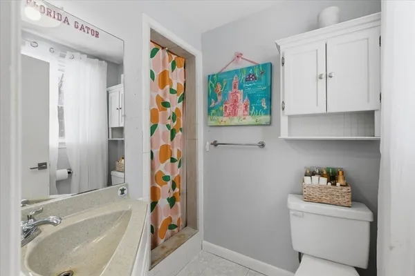 a bathroom with a bathtub and a sink