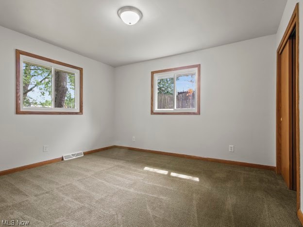 717 Struthers-Liberty Road Campbell, OH 44405 - Photo 8 of 14 Empty room featuring carpet floors