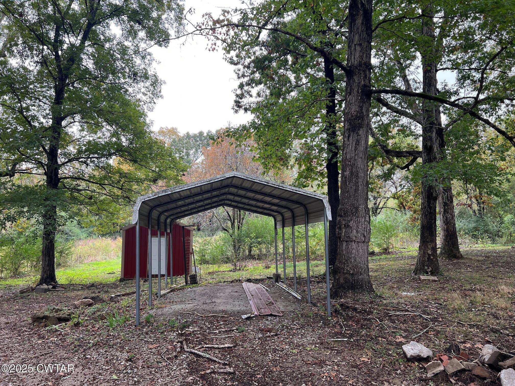 2215 Old Jacks Creek Road Henderson, TN 38340 - Photo 15 of 19 a view of outdoor space with lots of trees