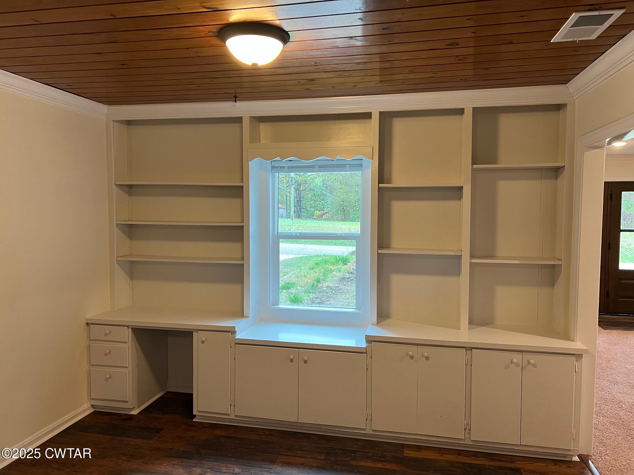 2215 Old Jacks Creek Road Henderson, TN 38340 - Photo 3 of 19 a view of an empty room with a window