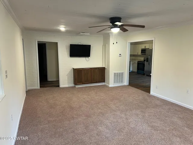 a view of a livingroom with an empty space