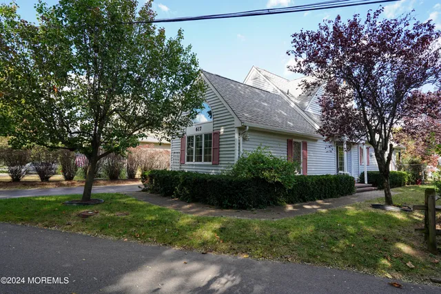 a view of a house with a garden