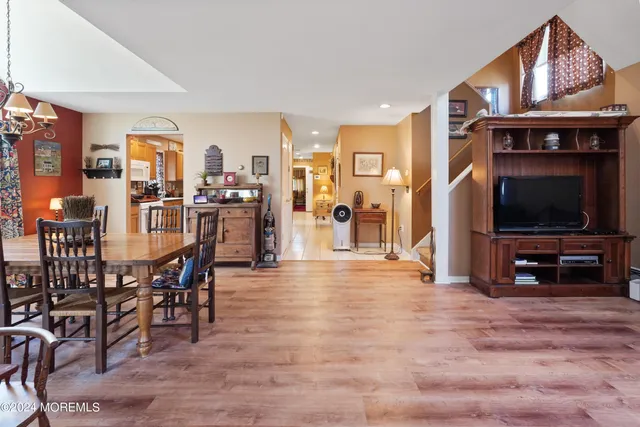 a view of a livingroom with furniture and window