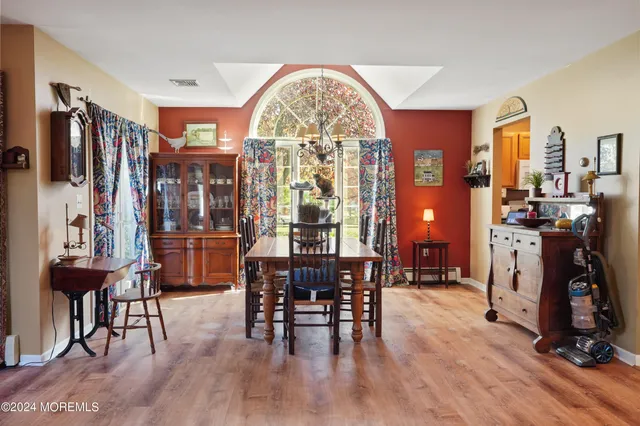 a view of a livingroom with furniture and window