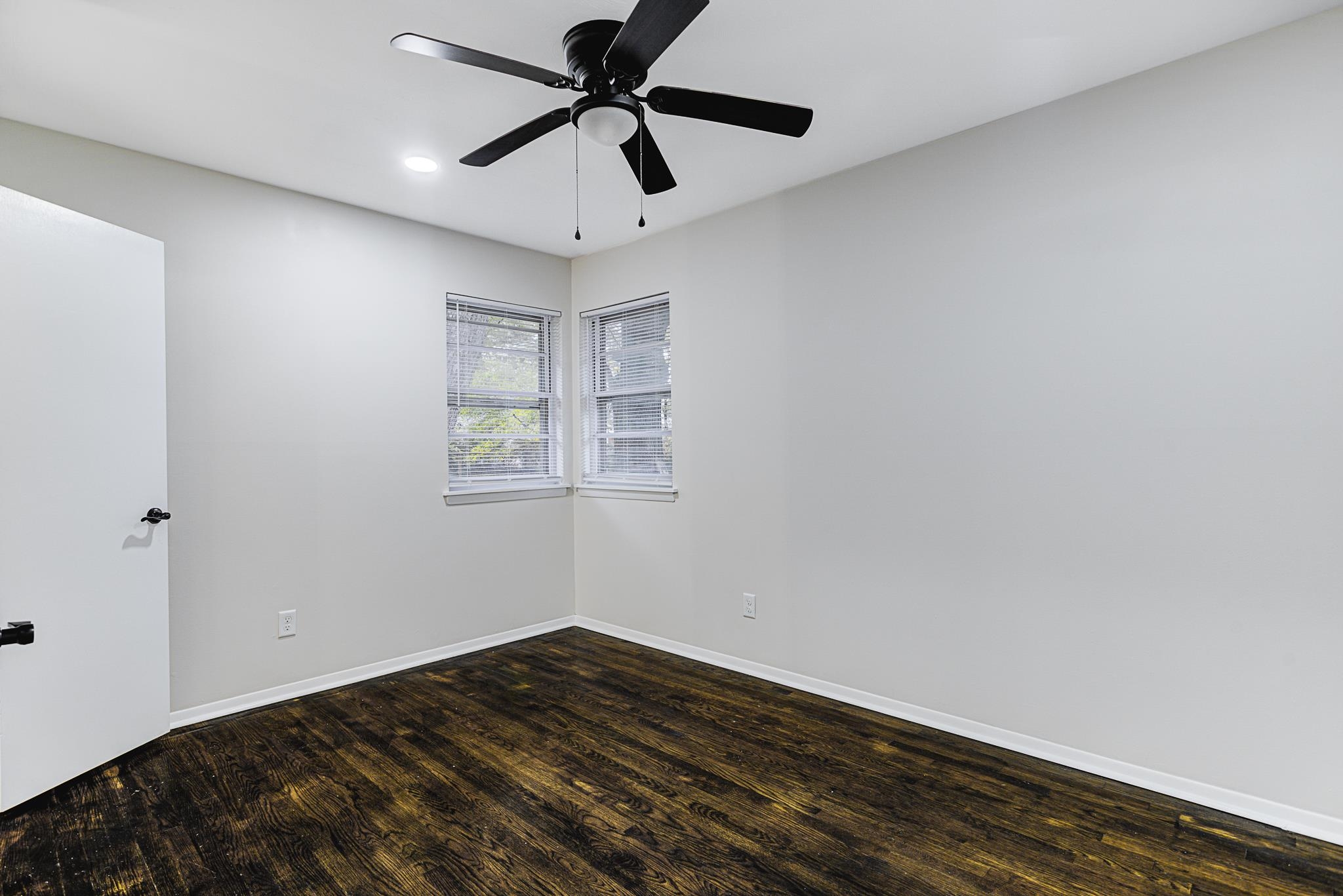 5094 Lochinvar Road Memphis, TN 38116 - Photo 13 of 23 Spare room featuring ceiling fan and dark hardwood / wood-style flooring