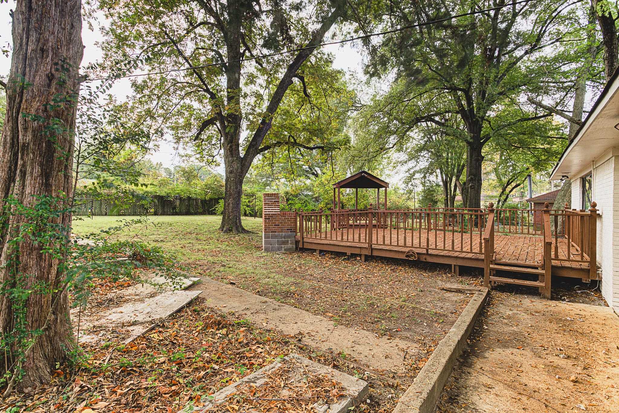 5094 Lochinvar Road Memphis, TN 38116 - Photo 21 of 23 View of yard with a deck