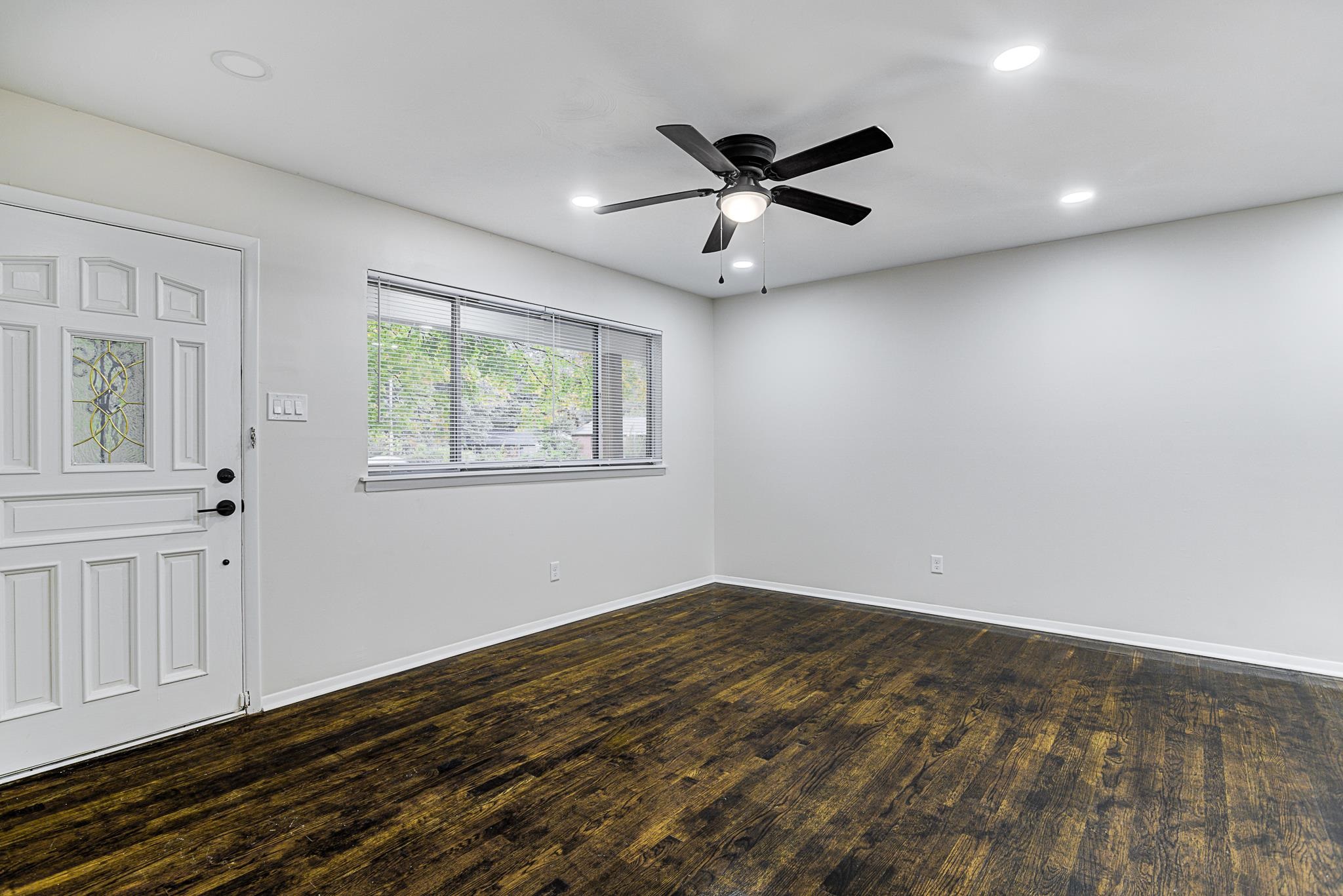 5094 Lochinvar Road Memphis, TN 38116 - Photo 3 of 23 Foyer featuring ceiling fan and dark hardwood / wood-style flooring
