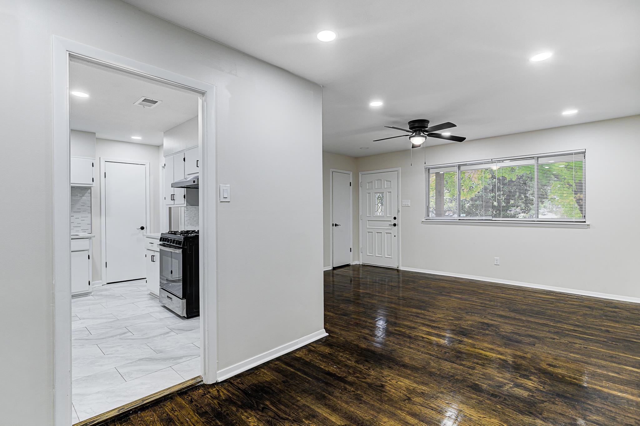 5094 Lochinvar Road Memphis, TN 38116 - Photo 5 of 23 Interior space with ceiling fan and light wood-type flooring