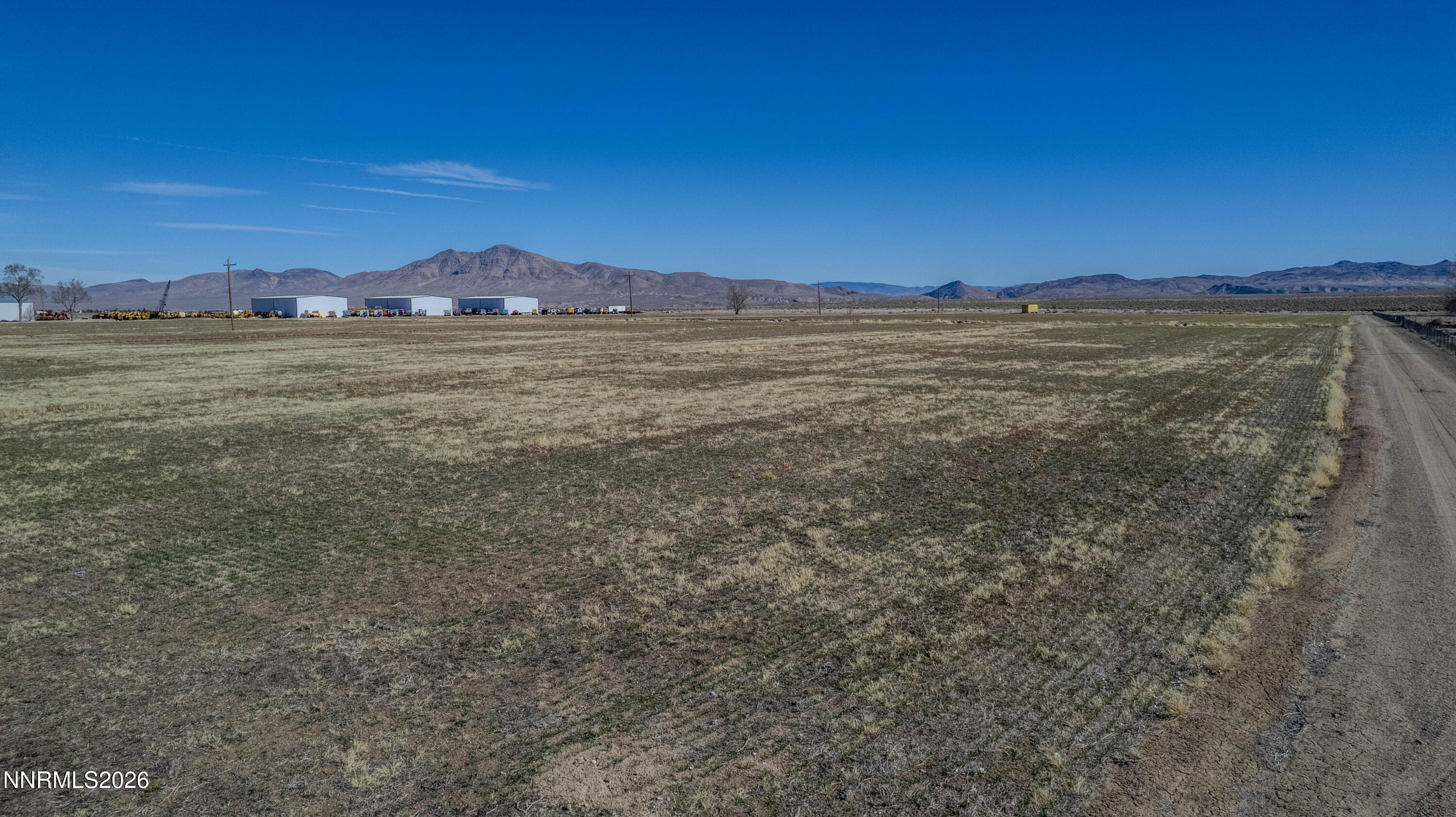 76 Hudson Aurora Road Smith Valley, NV 89430 - Photo 10 of 10 a view of a large building with a city view