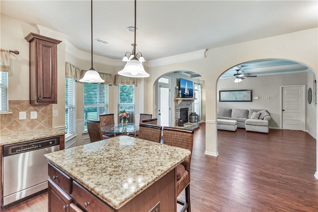 144 Buckland Drive Anderson, SC 29621 - Photo 37 of 48 An open concept design seamlessly connects the gourmet kitchen, sunlit breakfast nook, and inviting living area.