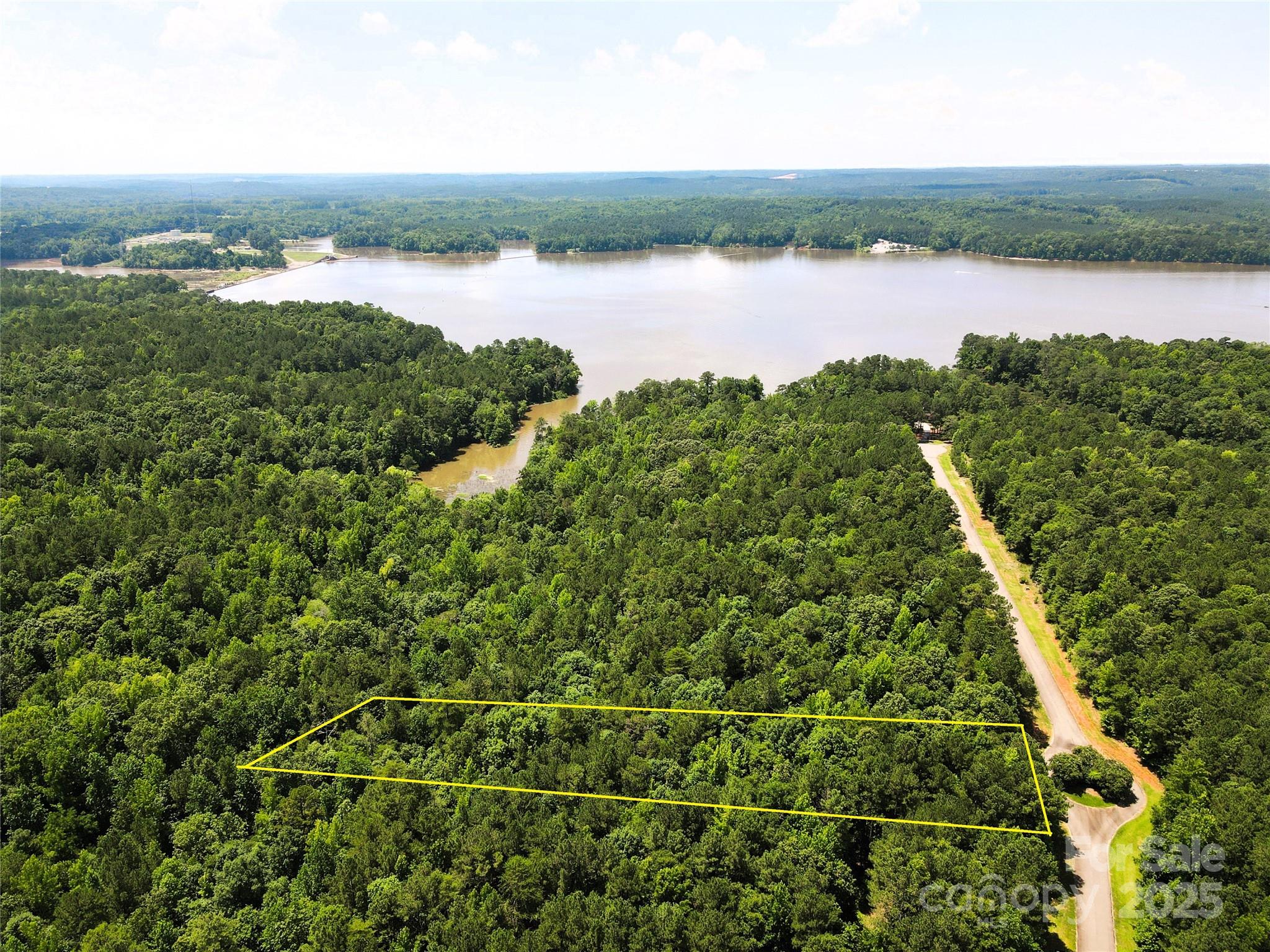 140 North State Lane Rockingham, NC 28379 - Photo 1 of 15 an aerial view of residential houses with outdoor space and lake view