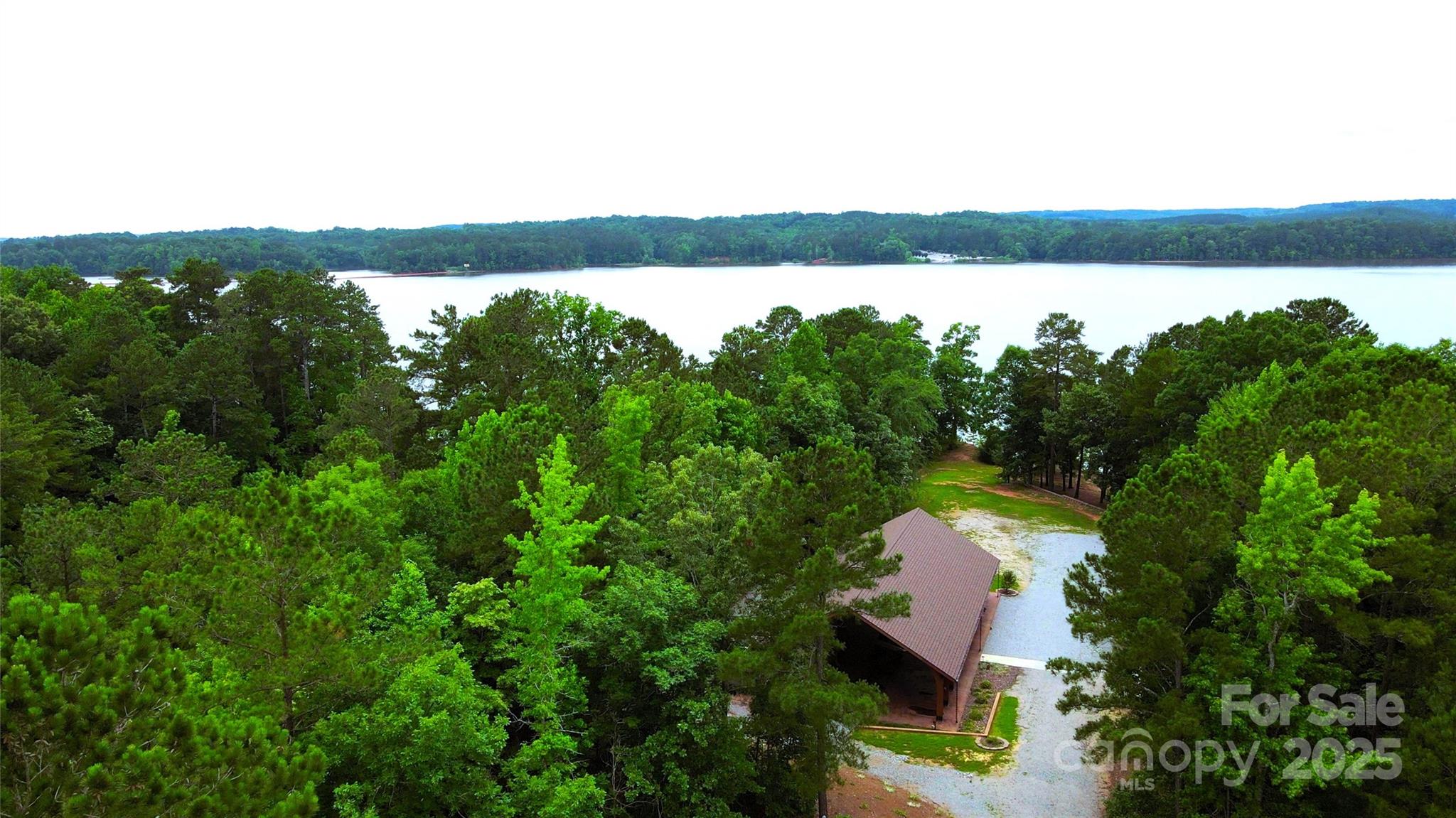 140 North State Lane Rockingham, NC 28379 - Photo 9 of 15 a view of a lake from a yard
