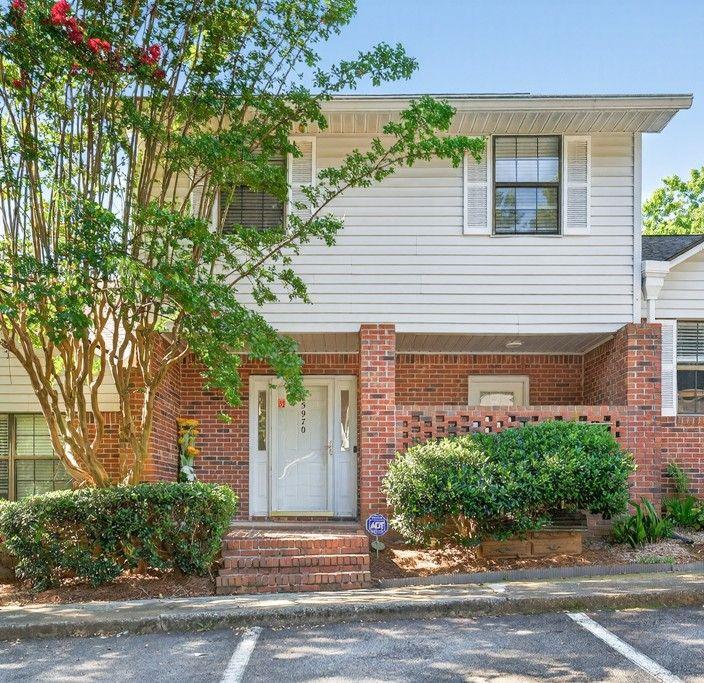 5970 WinterGreen Road Northwest Norcross, GA 30093 - Photo 2 of 34 a front view of a house with yard
