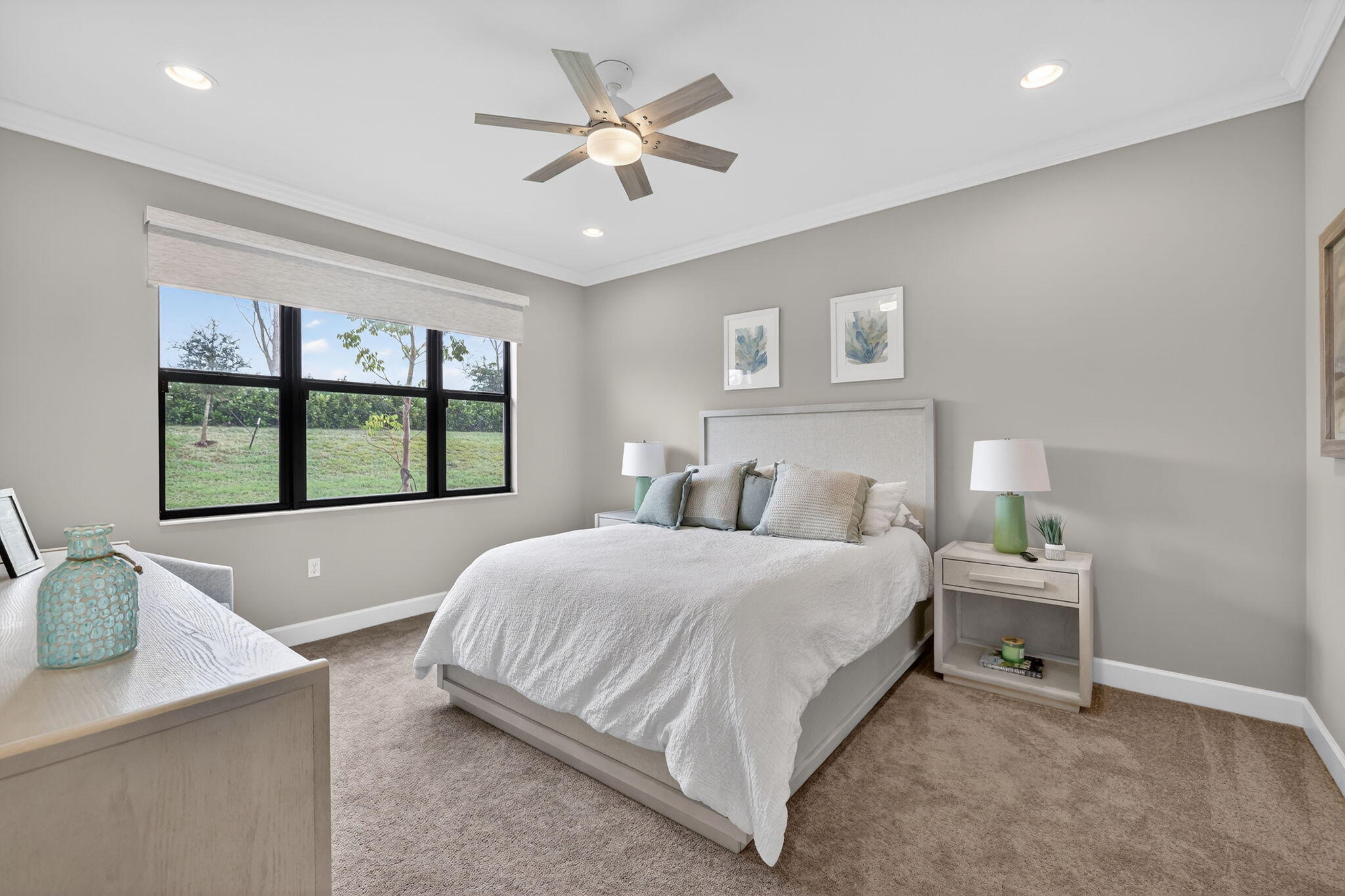 12447 Southwest Blue Mangrove Parkway Port St. Lucie, FL 34987 - Photo 21 of 80 a bedroom with a large bed and a window