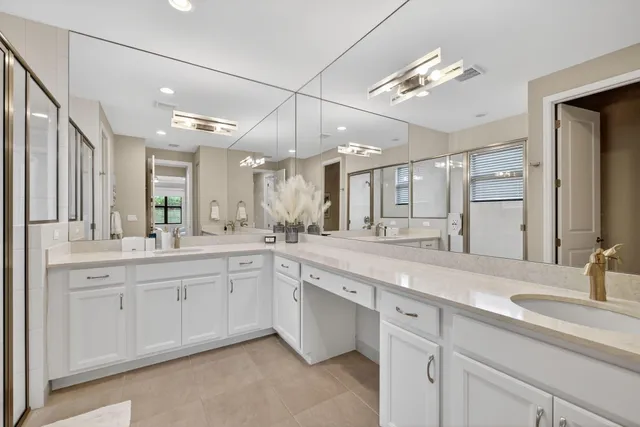 a view of a house with a yard and a garden