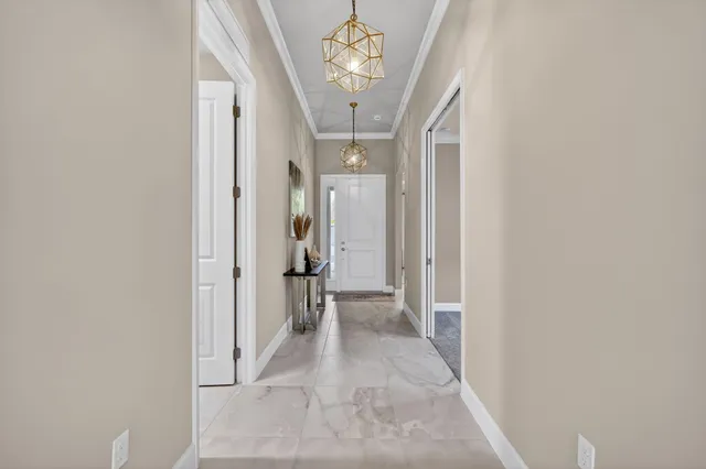 a view of kitchen with refrigerator microwave and wooden floor