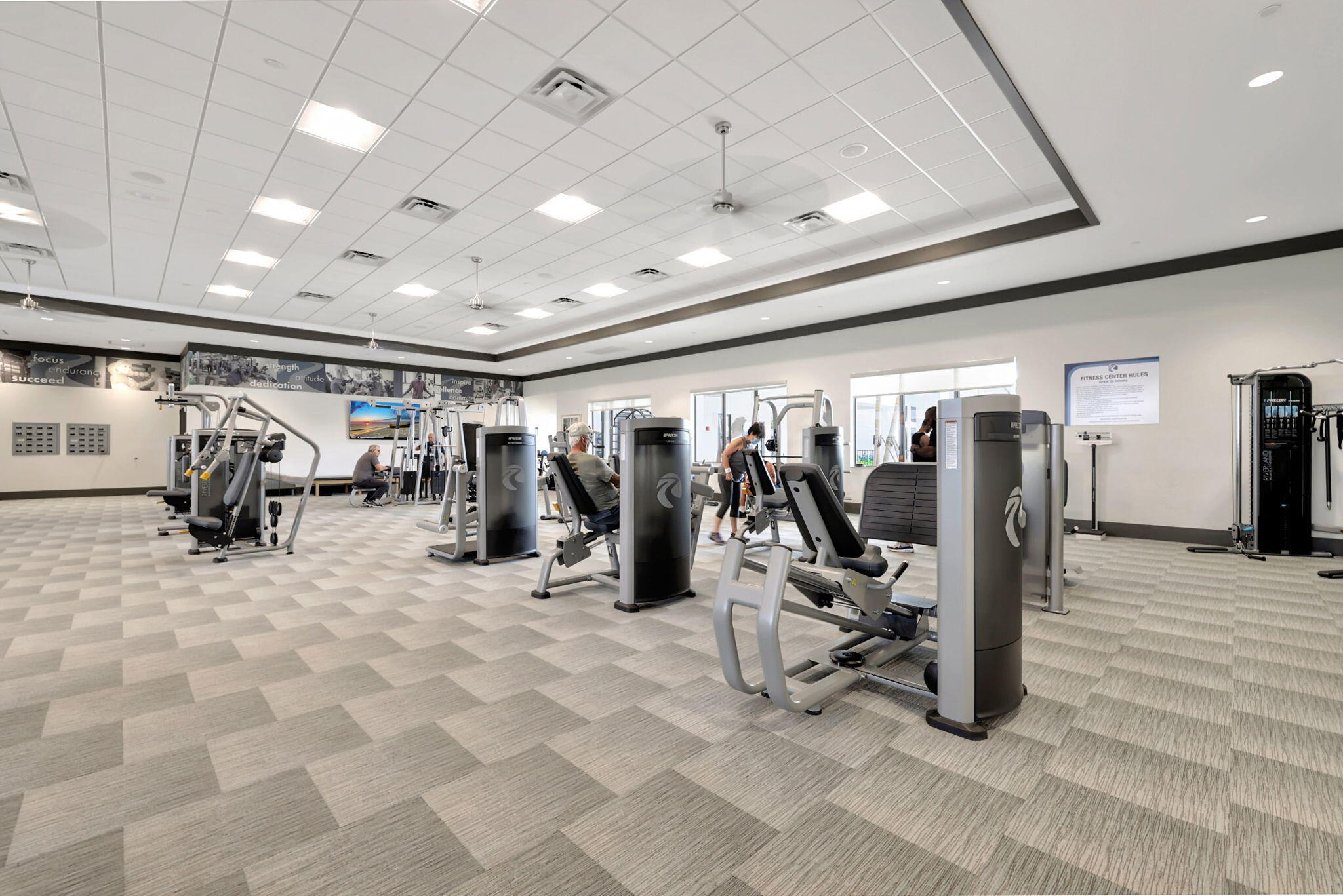 12447 Southwest Blue Mangrove Parkway Port St. Lucie, FL 34987 - Photo 51 of 80 a view of a room with gym equipment