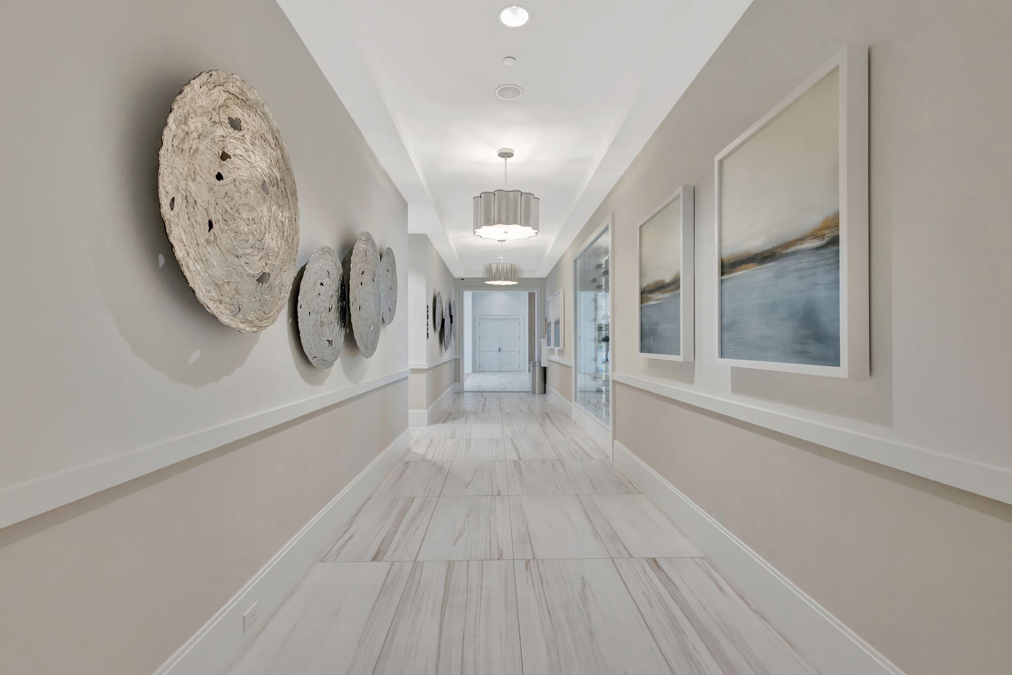 12447 Southwest Blue Mangrove Parkway Port St. Lucie, FL 34987 - Photo 73 of 80 a view of a hallway with wooden floor