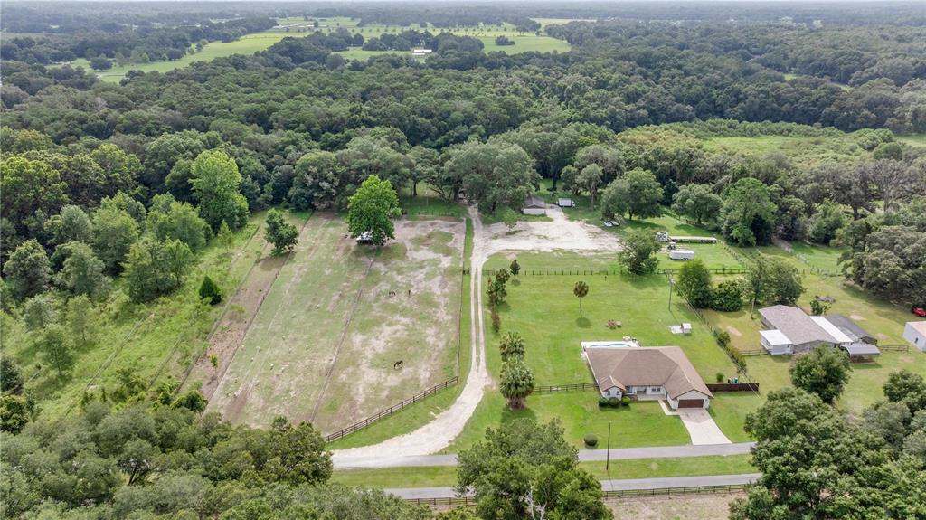 13783 Southeast 8th Court Ocala, FL 34480 - Photo 4 of 47 an aerial view of residential house with outdoor space