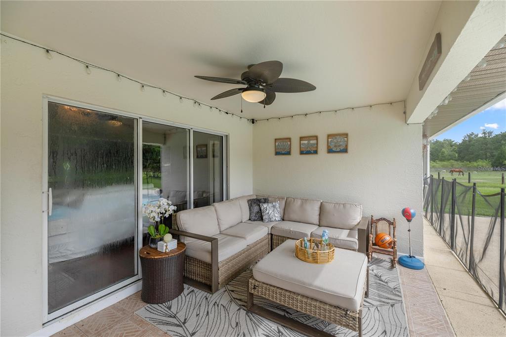 13783 Southeast 8th Court Ocala, FL 34480 - Photo 44 of 47 a living room with furniture and a potted plant