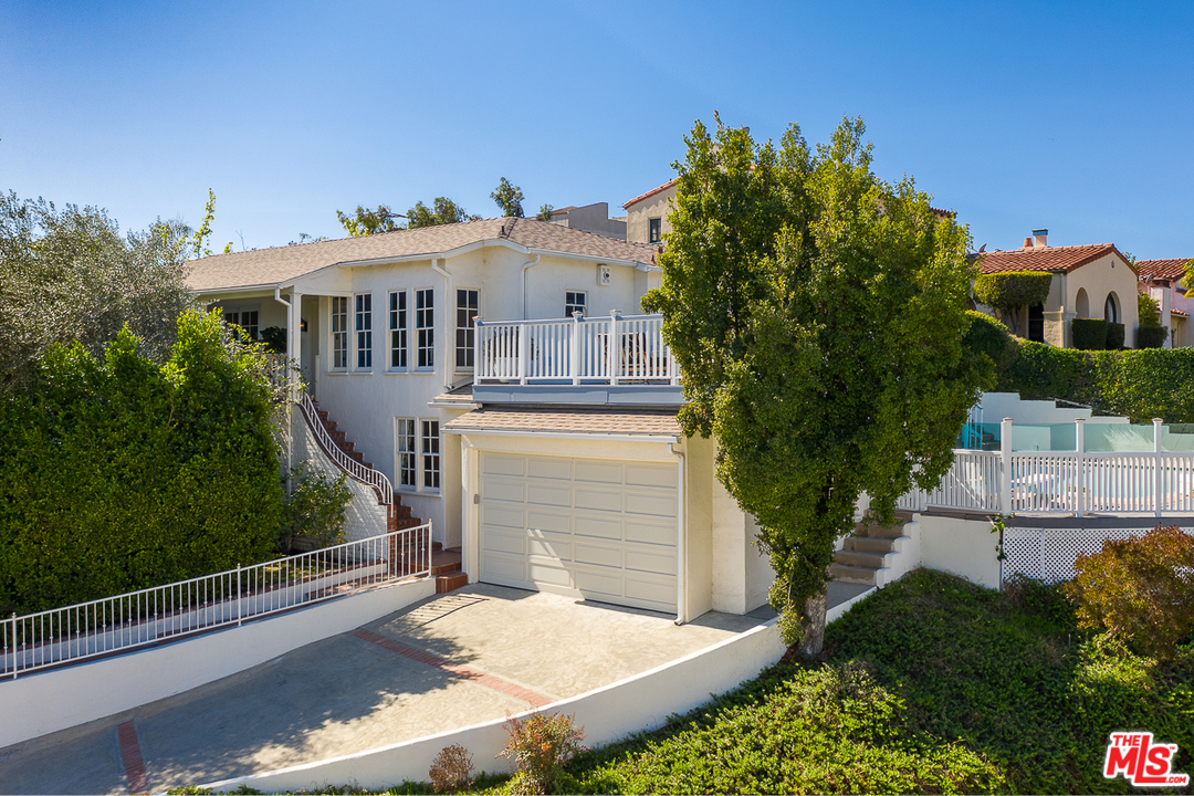 3347 Ley Drive Los Angeles, CA 90027 - Photo 2 of 54 a front view of a house with a yard