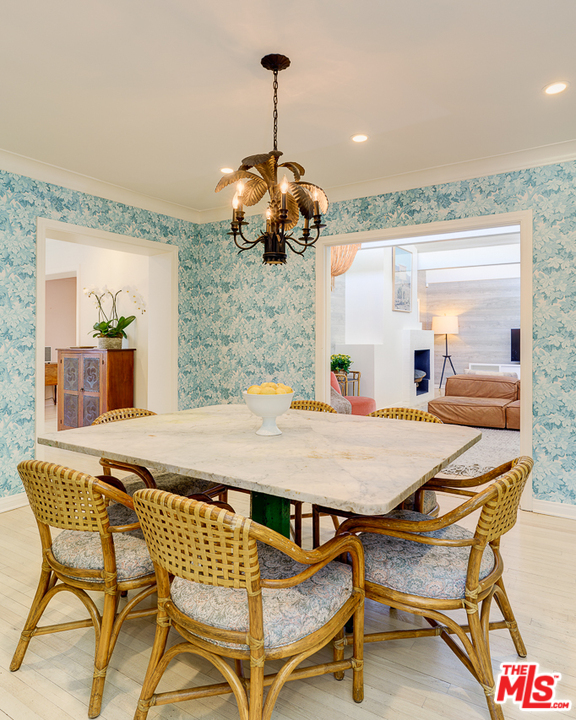 3347 Ley Drive Los Angeles, CA 90027 - Photo 26 of 54 a dining room with a table and chairs