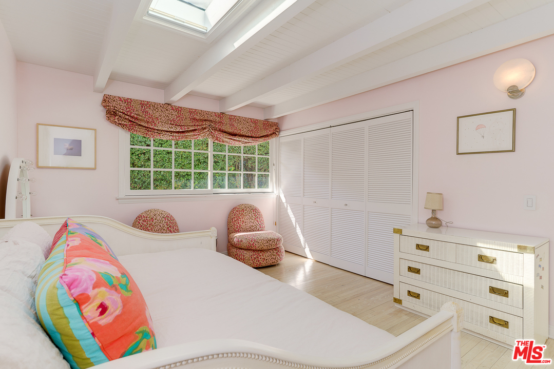 3347 Ley Drive Los Angeles, CA 90027 - Photo 30 of 54 a bedroom with a bed and a window