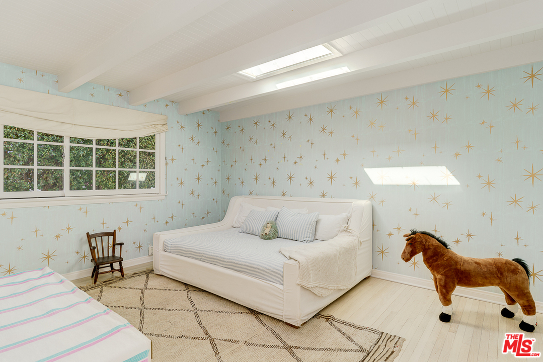 3347 Ley Drive Los Angeles, CA 90027 - Photo 32 of 54 a bedroom with a bed and a window