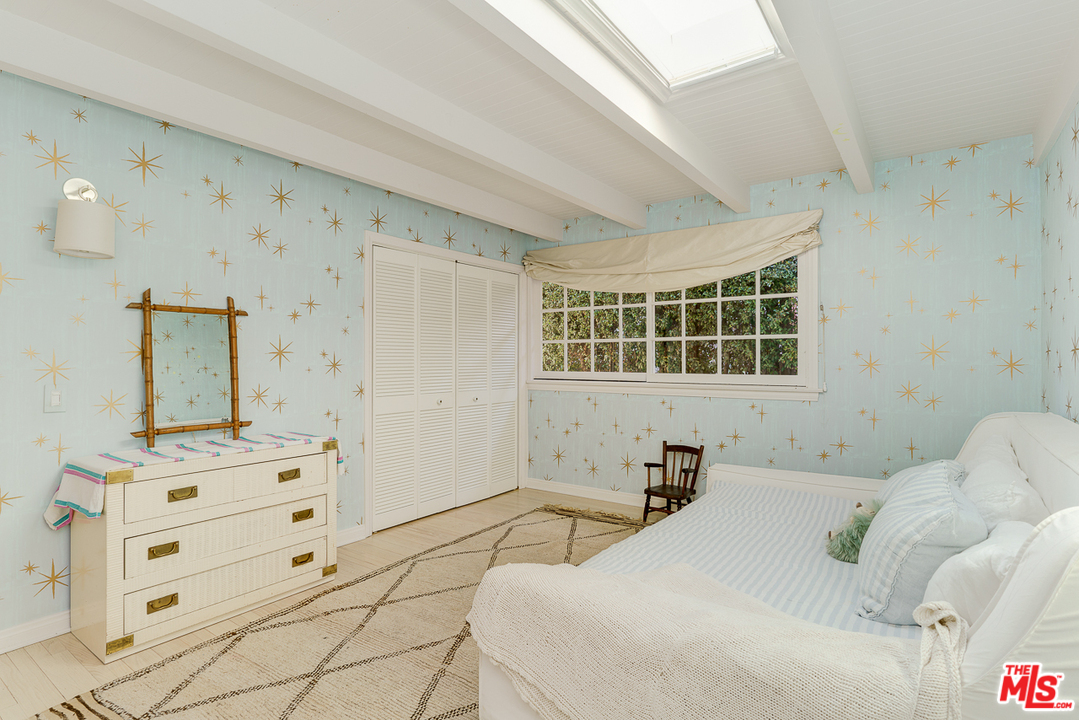 3347 Ley Drive Los Angeles, CA 90027 - Photo 33 of 54 a bedroom with a bed and a window