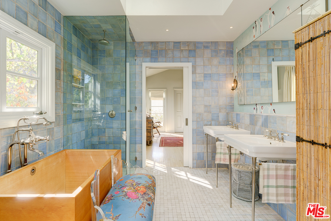 3347 Ley Drive Los Angeles, CA 90027 - Photo 36 of 54 a bathroom with a tub a sink and a shower