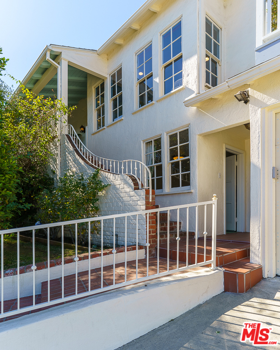 3347 Ley Drive Los Angeles, CA 90027 - Photo 39 of 54 a view of a brick house with a large window