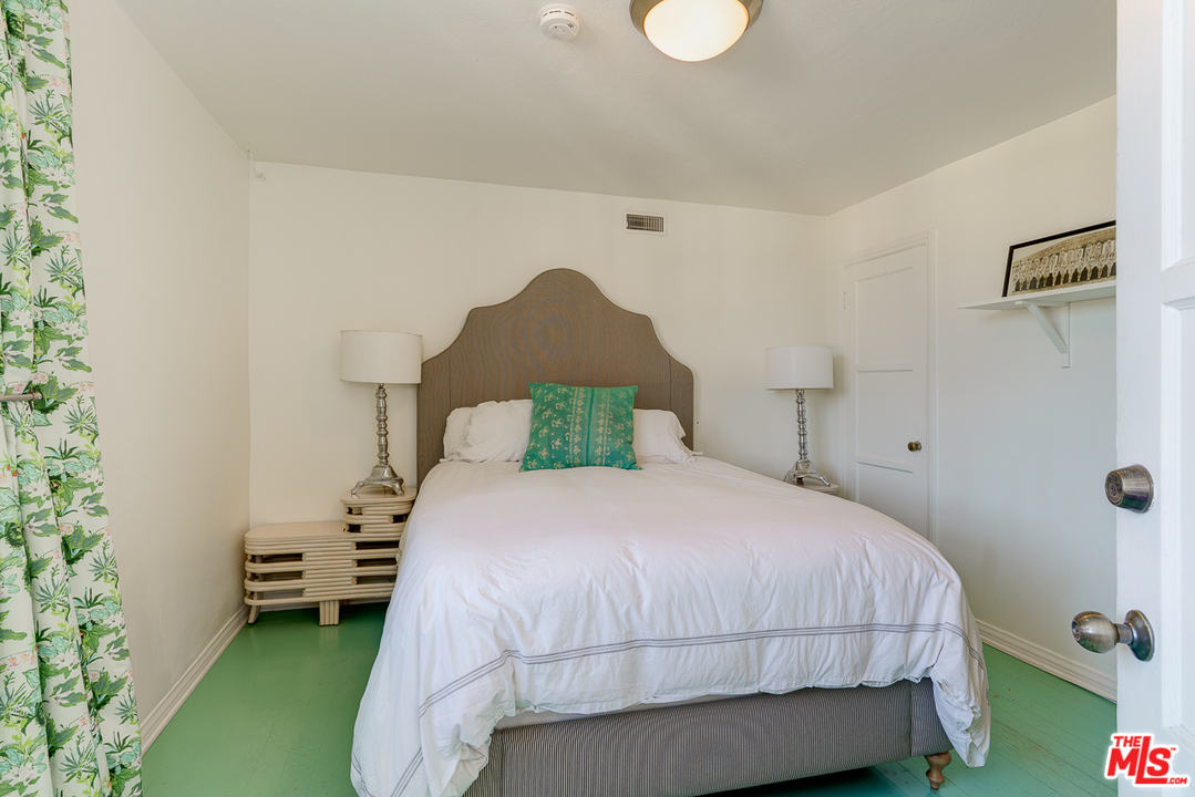 3347 Ley Drive Los Angeles, CA 90027 - Photo 40 of 54 a bedroom with a bed and a night stand