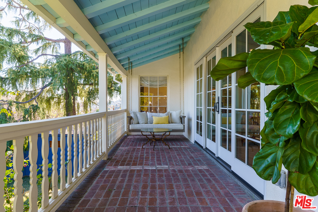 3347 Ley Drive Los Angeles, CA 90027 - Photo 5 of 54 a balcony with wooden floor