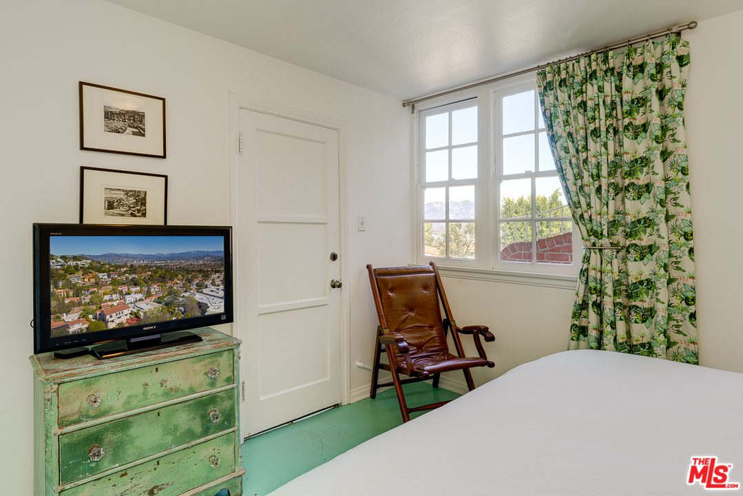 3347 Ley Drive Los Angeles, CA 90027 - Photo 41 of 54 a living room with furniture and a flat screen tv