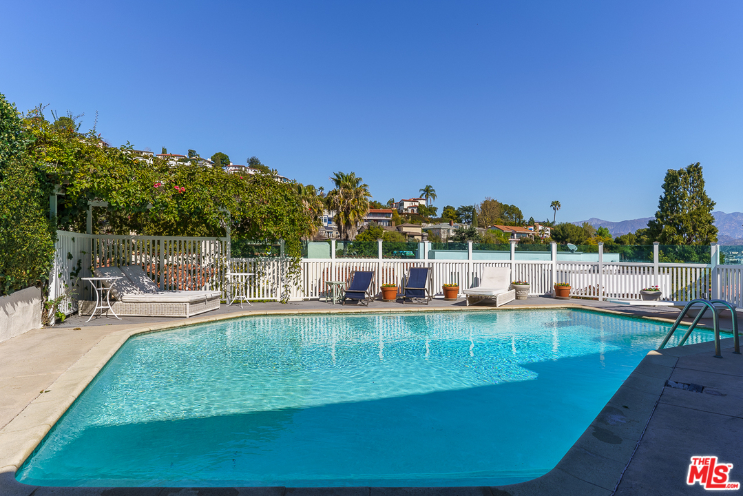 3347 Ley Drive Los Angeles, CA 90027 - Photo 44 of 54 a view of a swimming pool with outdoor seating