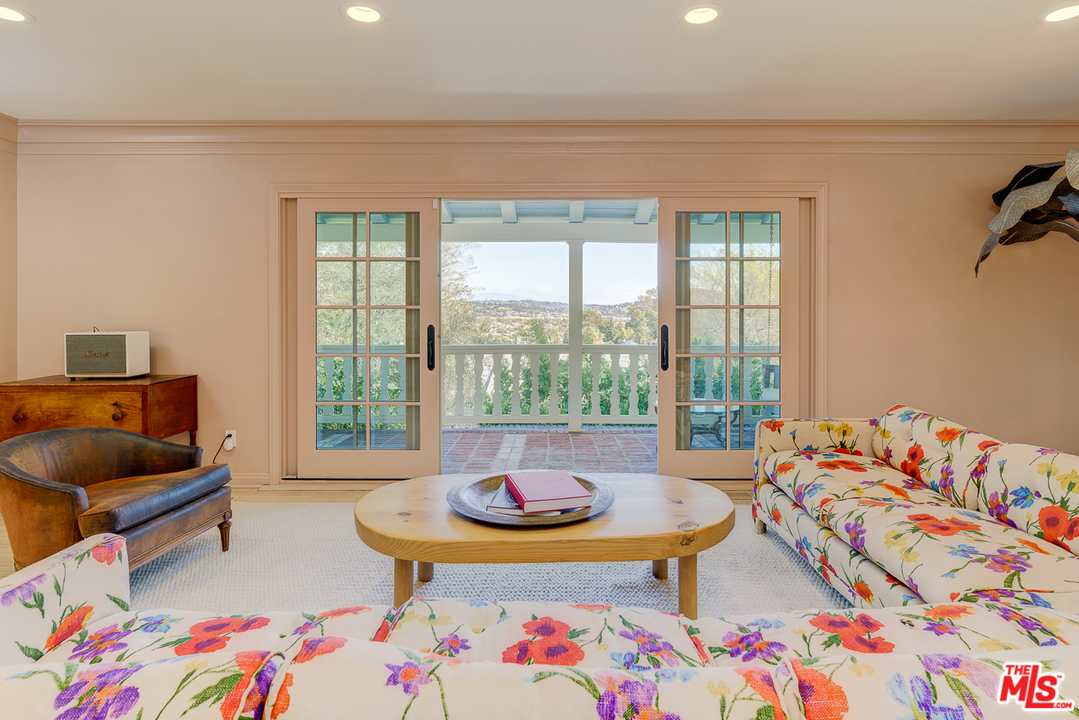 3347 Ley Drive Los Angeles, CA 90027 - Photo 8 of 54 a bedroom with a bed and a couch