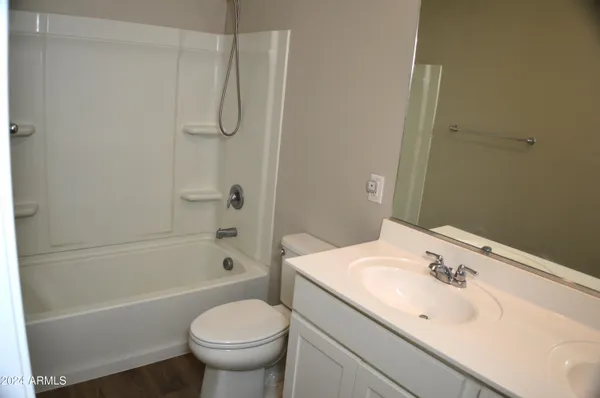 a bathroom with a sink and toilet