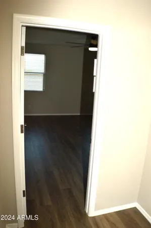 a view of a livingroom with wooden floor