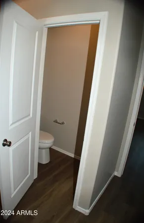 a view of a room with an empty walk in closet
