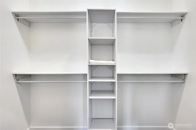 a view of an empty walk in closet