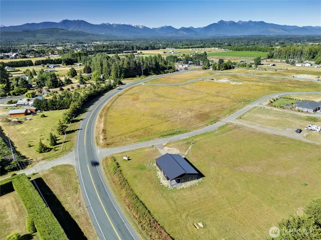 a view of a swimming pool with a lake