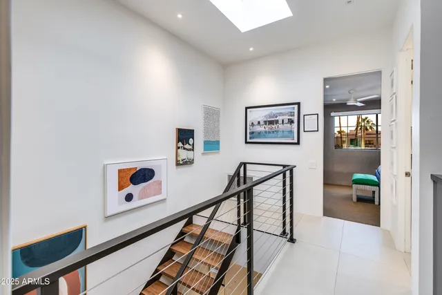 a kitchen with stainless steel appliances a stove refrigerator and microwave