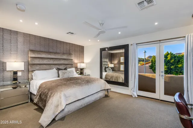 a kitchen with stainless steel appliances a stove a refrigerator and a microwave