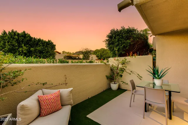 a view of swimming pool with a patio