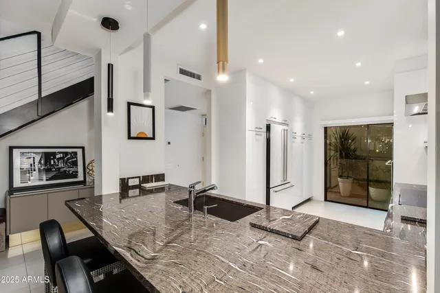 a view of a dining room with furniture