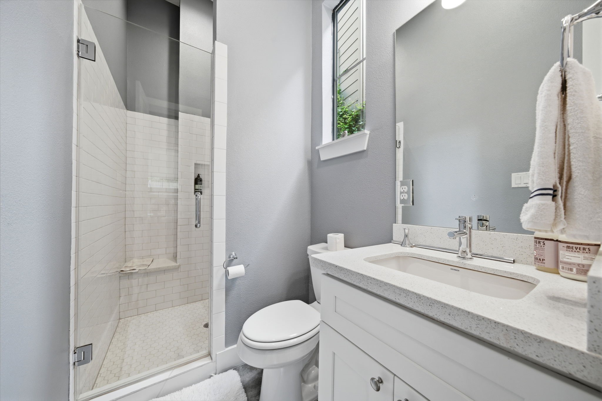 4306 Center Street Houston, TX 77007 - Photo 16 of 28 a bathroom with a sink toilet and shower