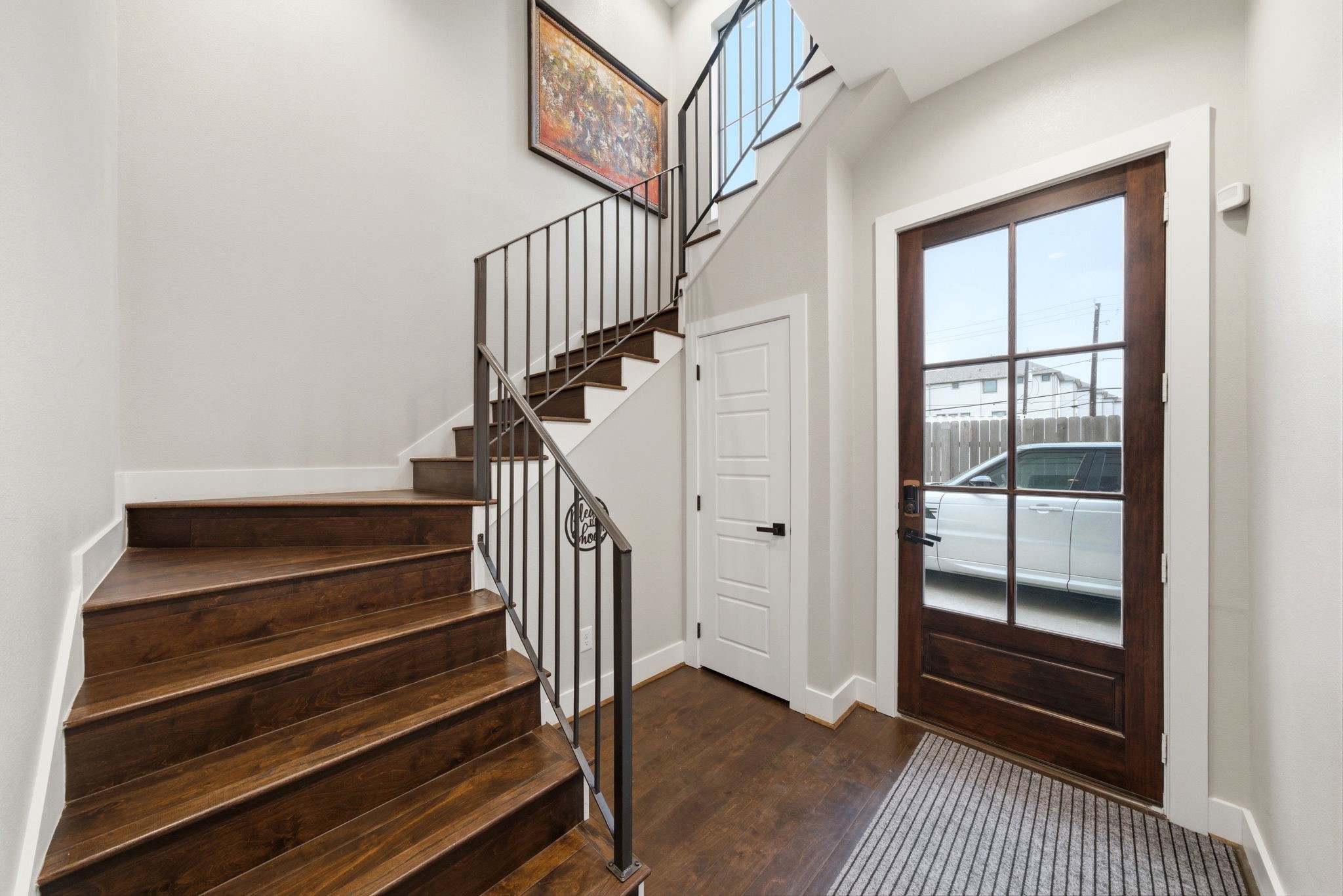 4306 Center Street Houston, TX 77007 - Photo 6 of 28 a view of entryway and hall with wooden floor