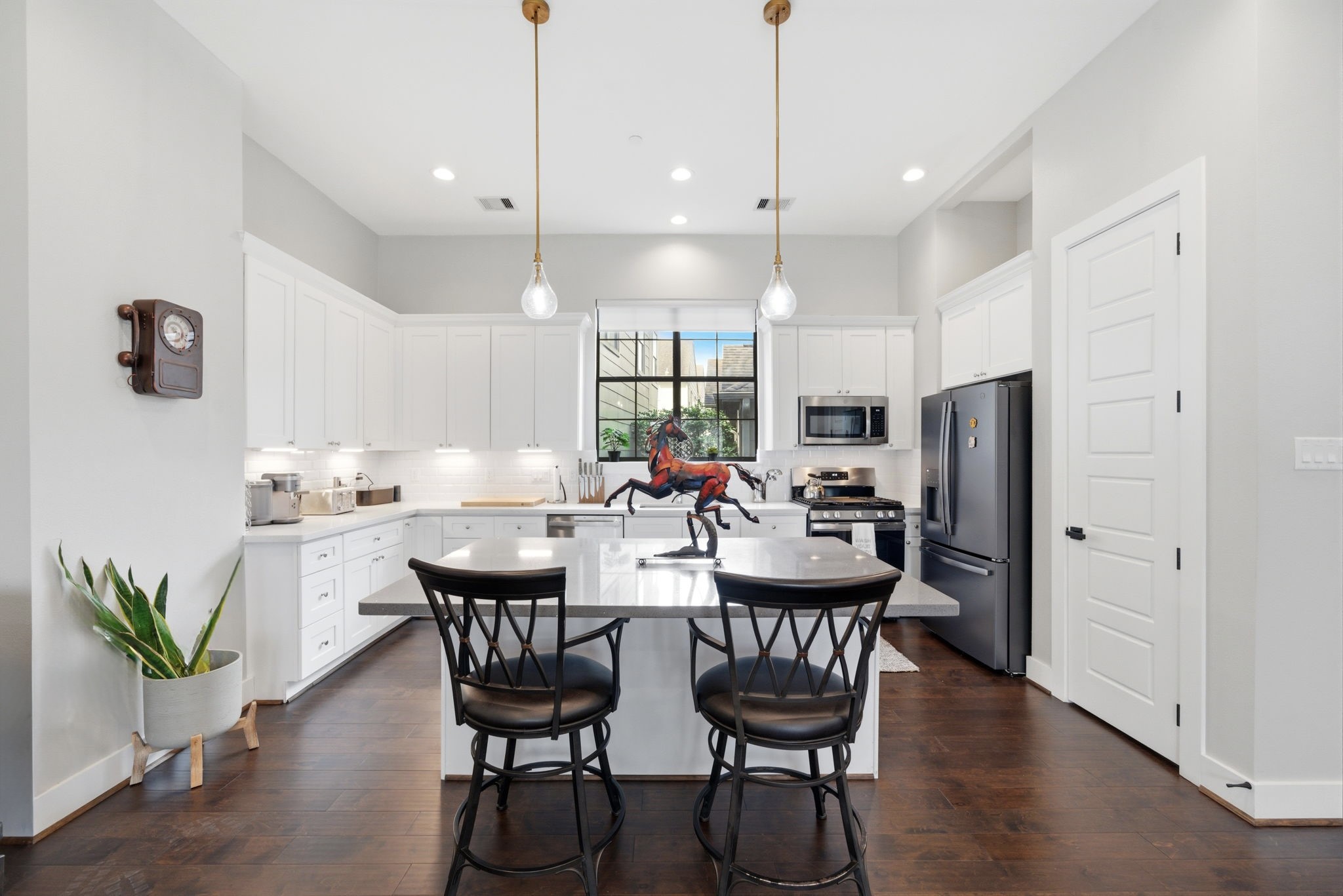 4306 Center Street Houston, TX 77007 - Photo 7 of 28 a view of a dining room with furniture window and wooden floor