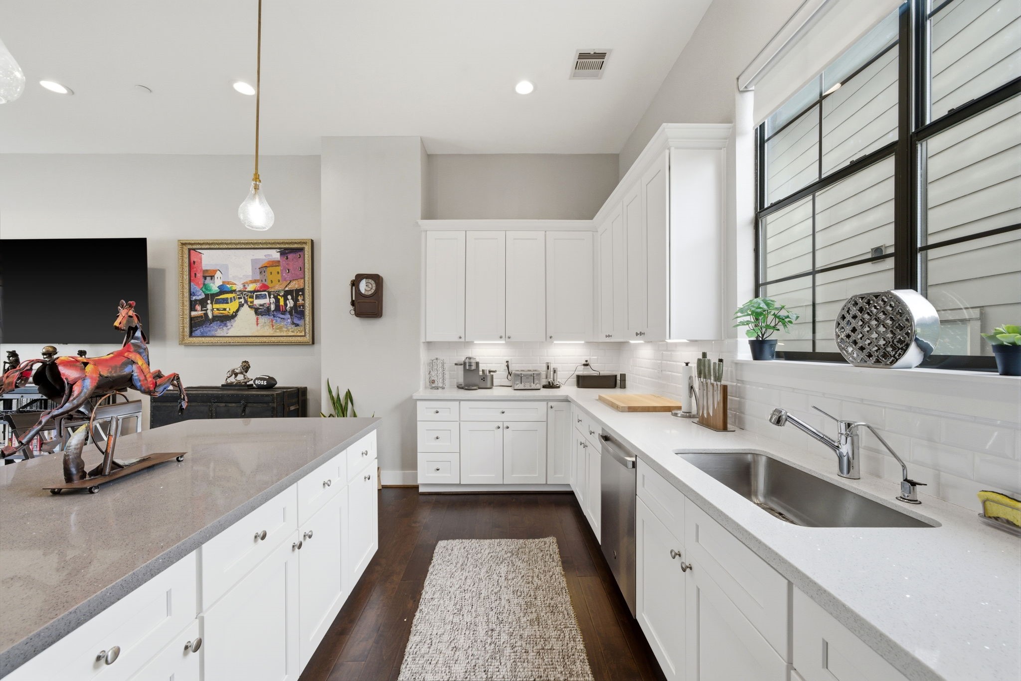 4306 Center Street Houston, TX 77007 - Photo 8 of 28 a kitchen with a sink stove and cabinets